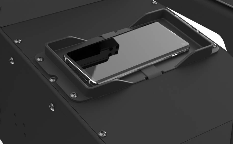 Wireless Cell Phone Charger Faceplate AS4.F112.025 with phone in console.jpg